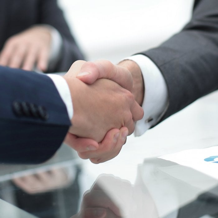 close up.handshake of business partners handshake business colleagues in office