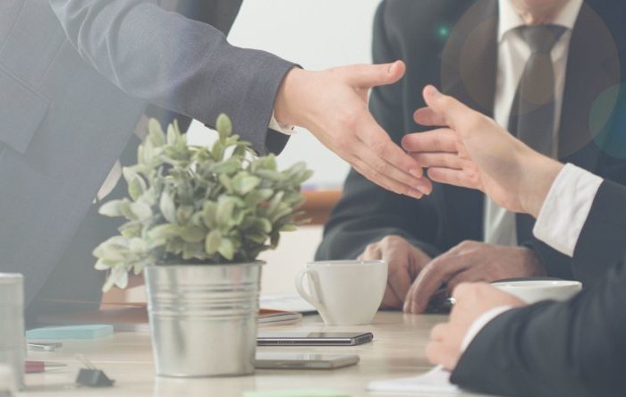 Panorama of handshake on a business meeting